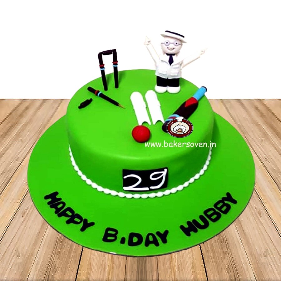 Cricket Ball And Bat Theme Piñata Cake | bakehoney.com